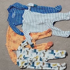 Lot of 4 zippered footie sleepers Carters 9 months